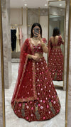 Scarlet Peacock Lehenga – A Celebration of Art & Elegance